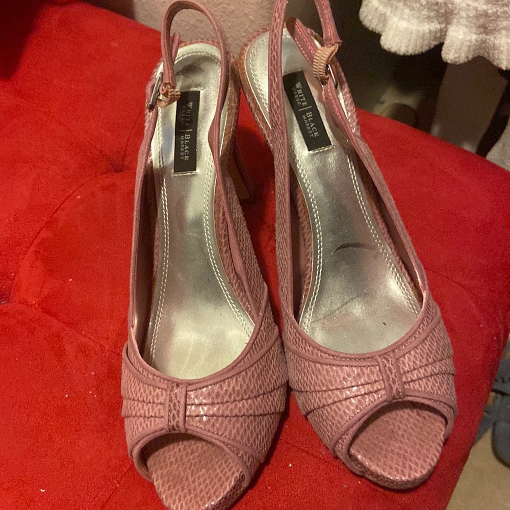 Pink snake skin peep toe heel.